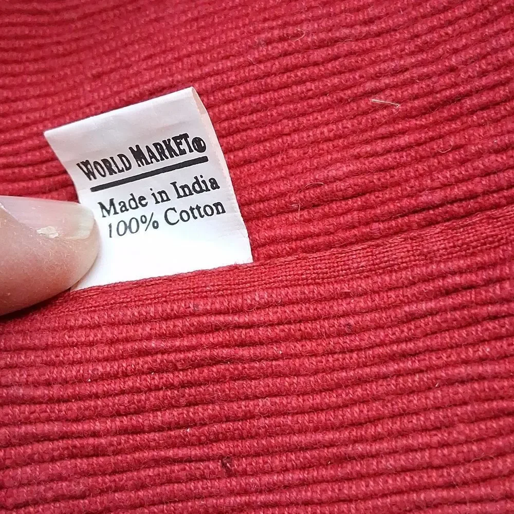 Set of 7‎ red corduroy placemats.